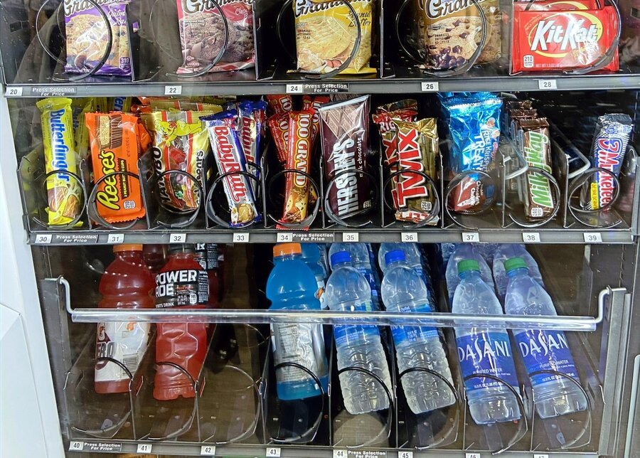 Combo vending machine offering snacks and drinks