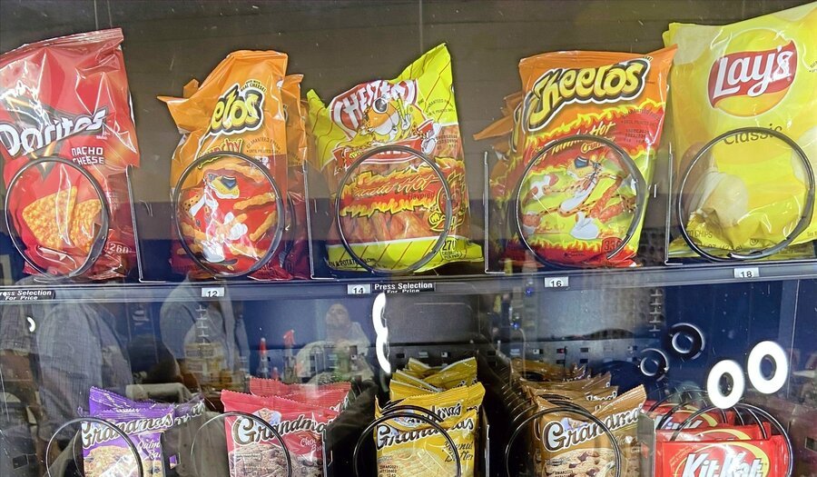 Snack vending machine stocked with snacks